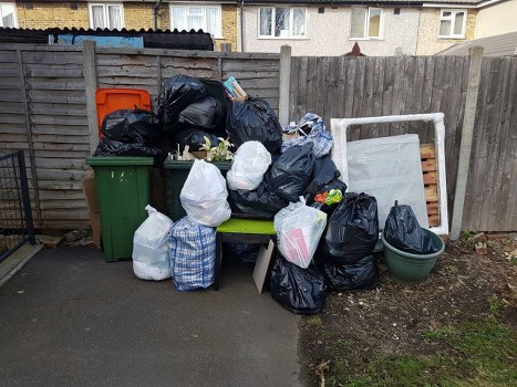 Earls Court skip at residential site, insured rubbish service